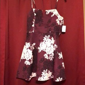 Maroon dress with black and white flowers